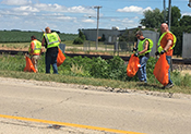 Martin Employees volunteer to clean litter along Hwy 34 leading to Martin Engineering's world headquarters.
